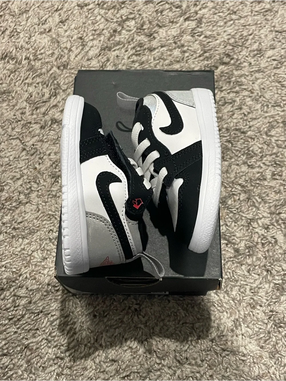 Jordan Black and White Toddler Sneakers with Red Accent